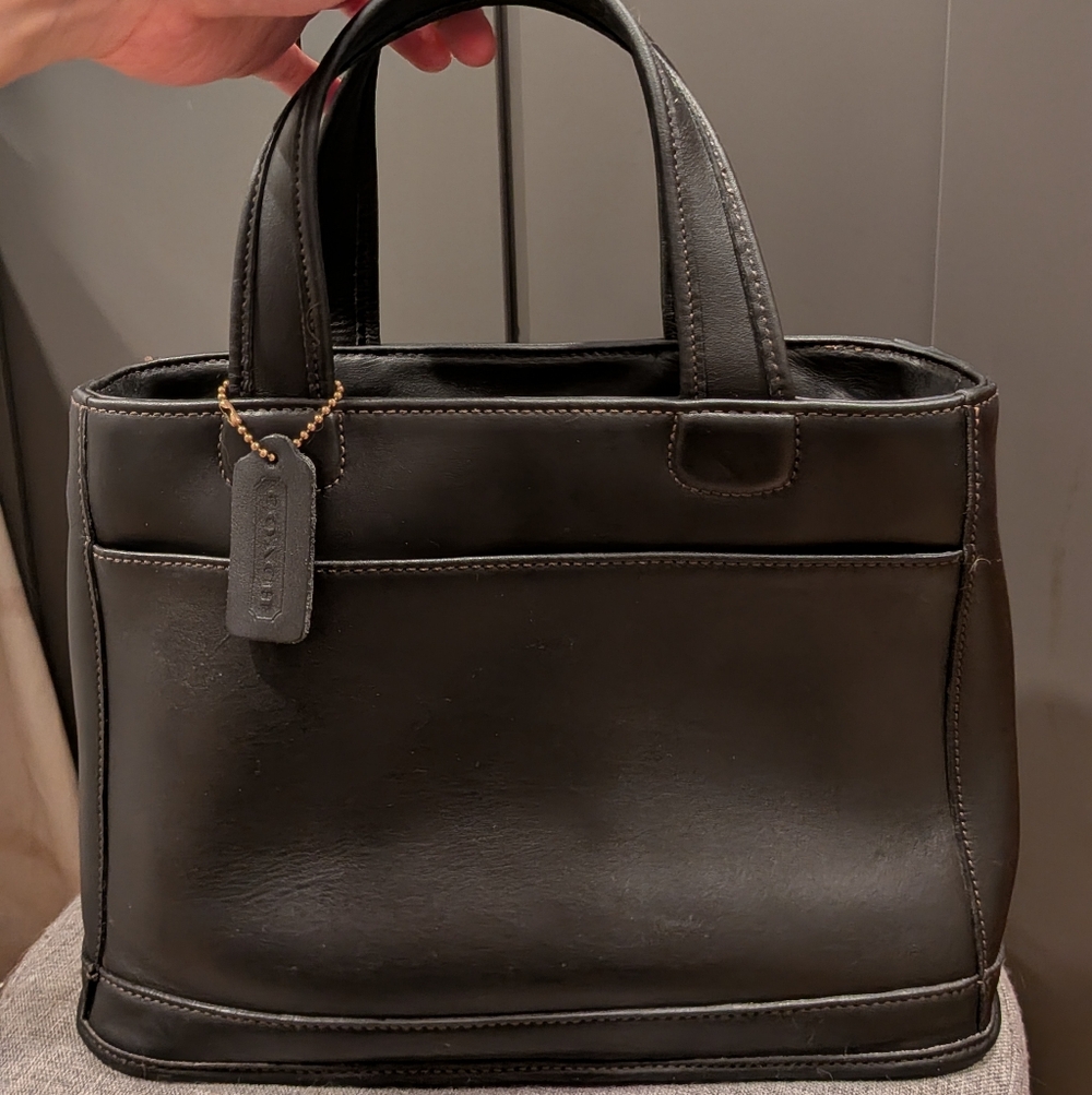 Coach Black Leather Interior with Brass Zipper Detail